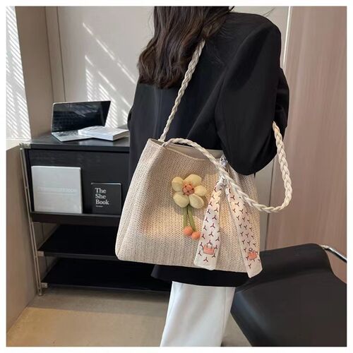 2024新款小众包包女潮手工编织爆款托特水桶包女大容量草编包