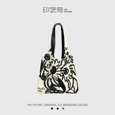 印艺苑原创向日葵帆布包2025新款上班通勤大容量松弛感黑色单肩袋