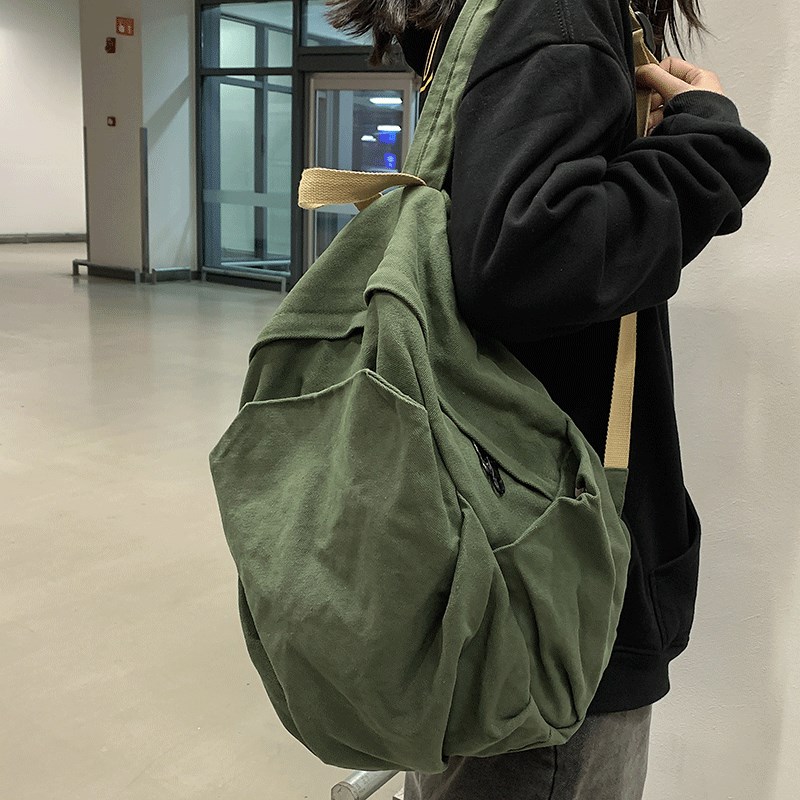 轻便帆布双肩包女2024新款大学生高中休闲复古旅游背包大容量书包