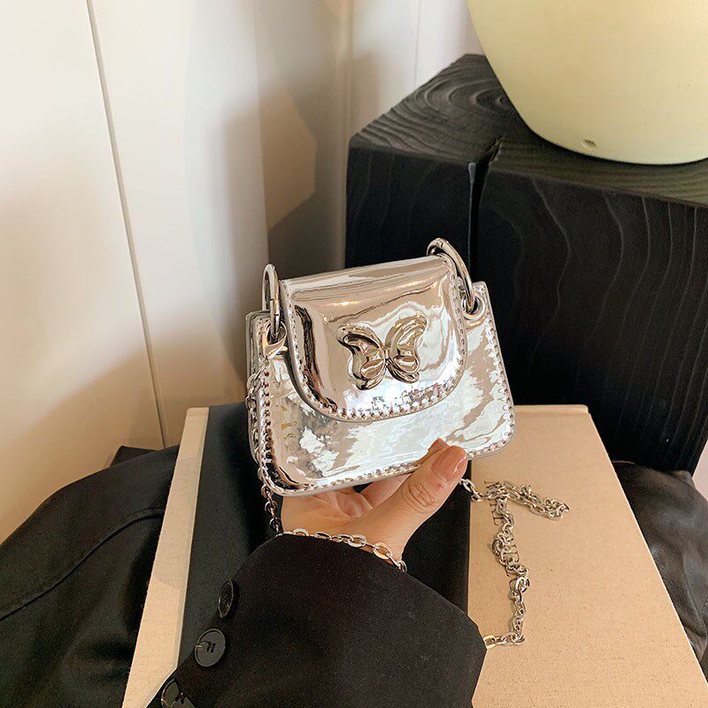 潮酷洋气儿童包包时尚女童宝宝银色亮面零钱包公主外出配饰斜挎包