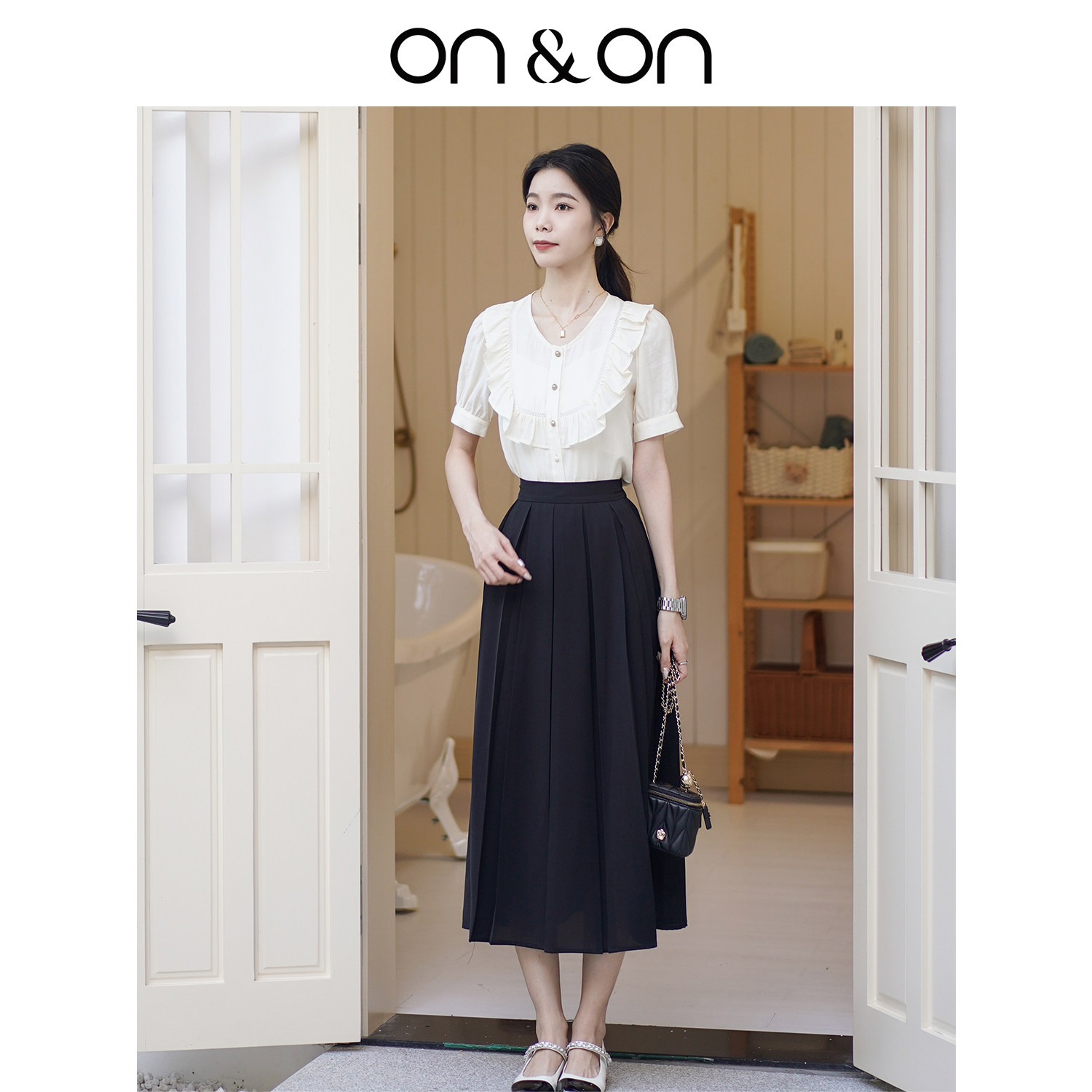 ON＆ON/安乃安2025秋季新款经典百褶黑色中长A字伞高腰时尚