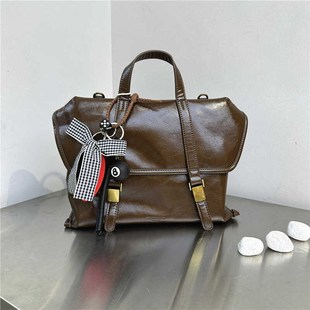 莱曼多斯新款复古软面双肩包游历大容量多背法公文包手提斜挎女包