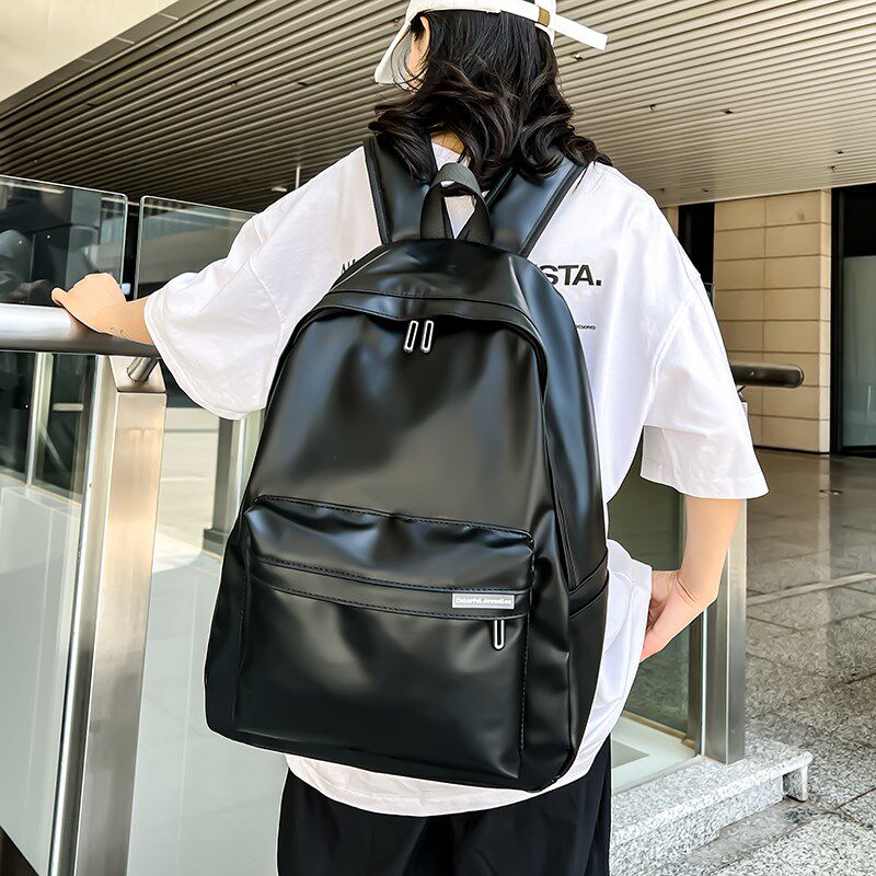 新款潮牌学生背包旅行包电脑书包时尚大容量双肩包PU通勤背包百搭