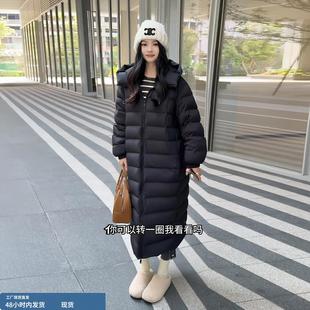 韩版黑色长款排骨羽绒服女款2025冬季爆款宽松保暖高级感连帽外套