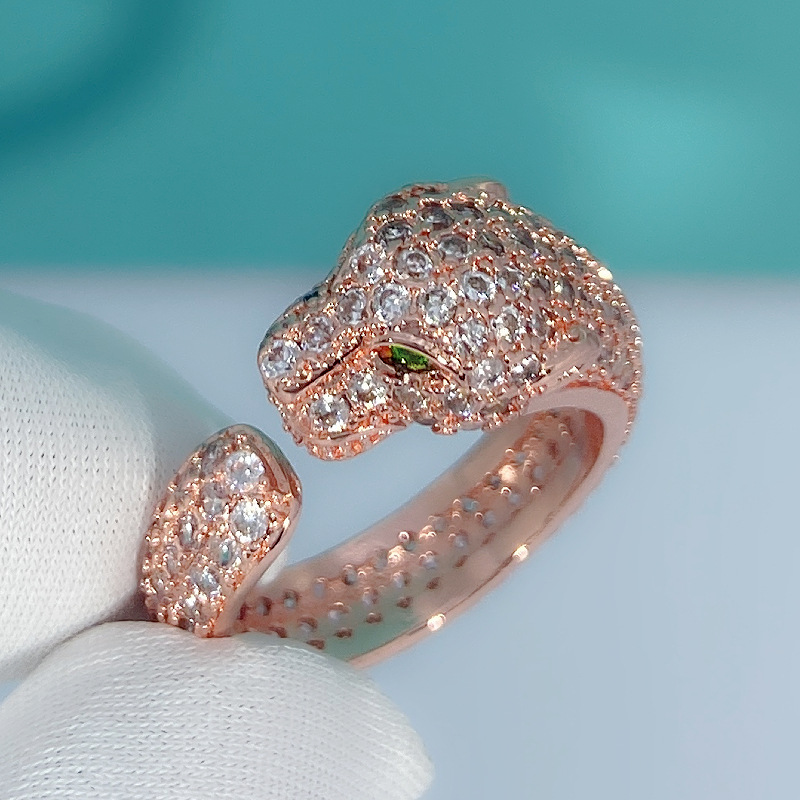 钻石之乡河南柘城河南人工钻石经典时尚绿眼金钱豹戒指 镶嵌锆石