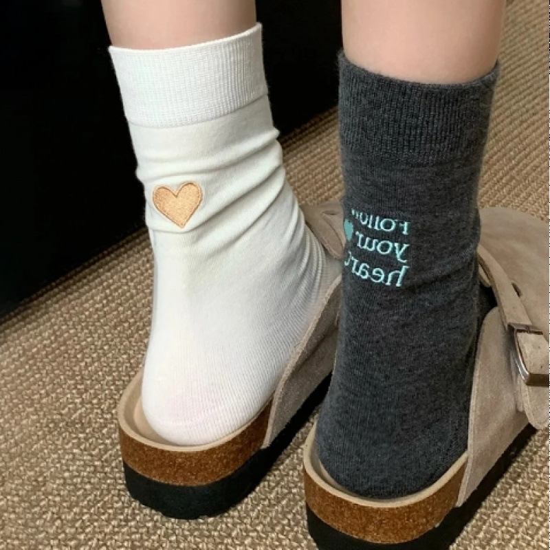 袜子爆款2025新款春秋季中长筒袜爱心字母ins秋冬骨堆堆袜xxx
