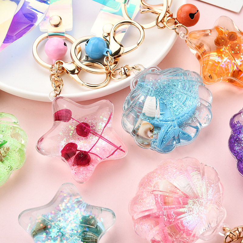 创意韩版流沙亮片亚克力入油海星贝壳钥匙扣幻彩镭射皮绳包包挂件