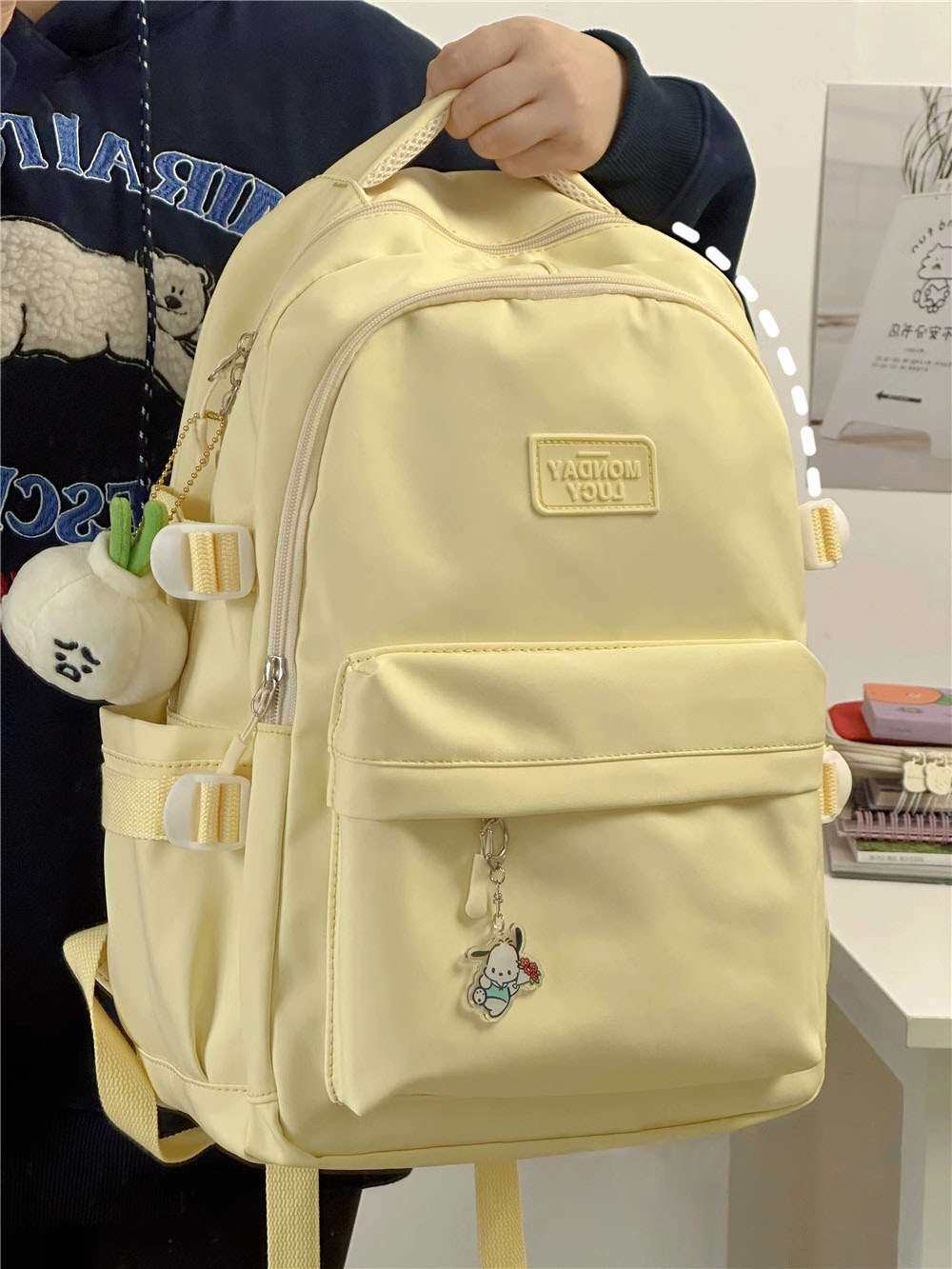 奶黄色书包日系新款初中学生双肩背包青少年高中大容量颜值高