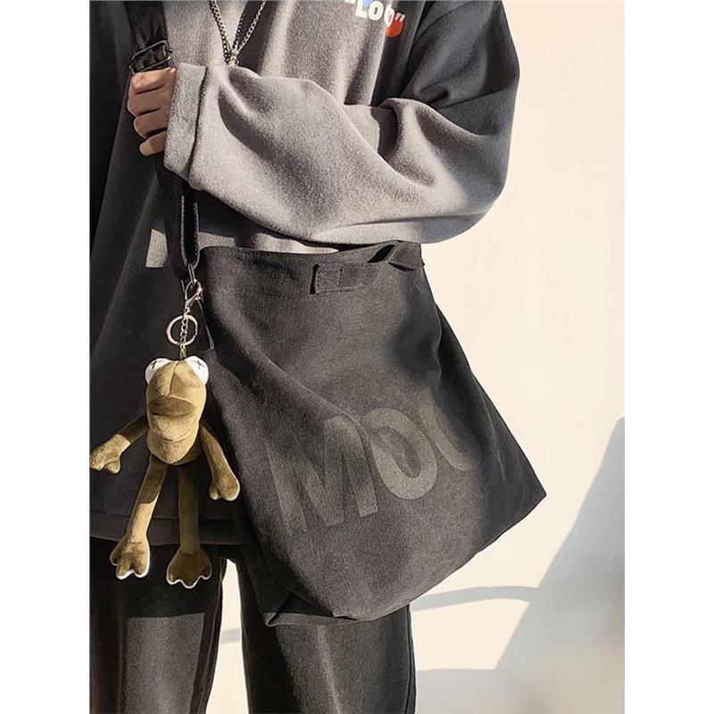 帆布包男斜挎包大容量日系男生斜跨背包女休闲邮差学生男士单肩包