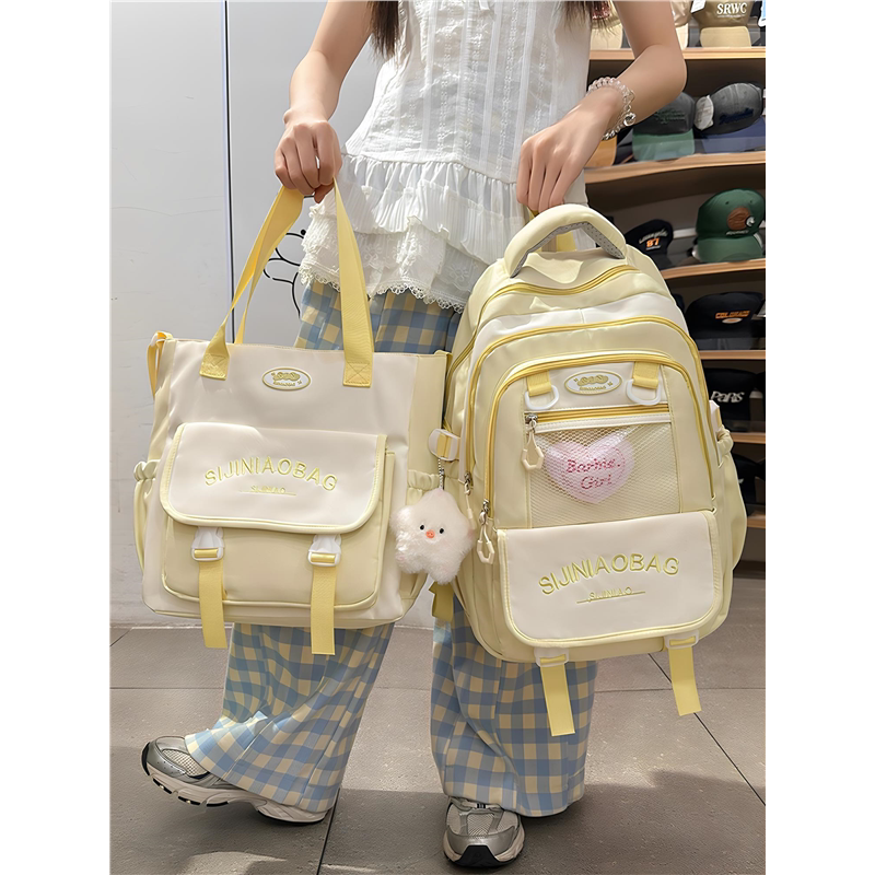 书包女生小学生三到六年级减负超轻便大容量初中生双肩包可爱高中