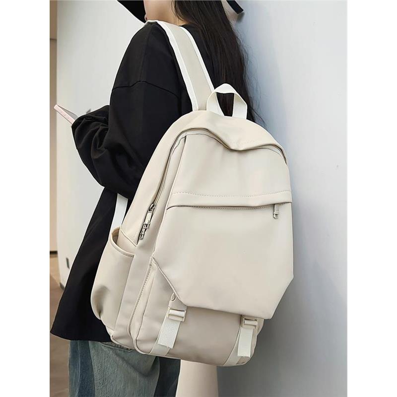 PU皮质休闲时尚纯色大容量书包女大学生电脑背包男生旅行双肩包皮