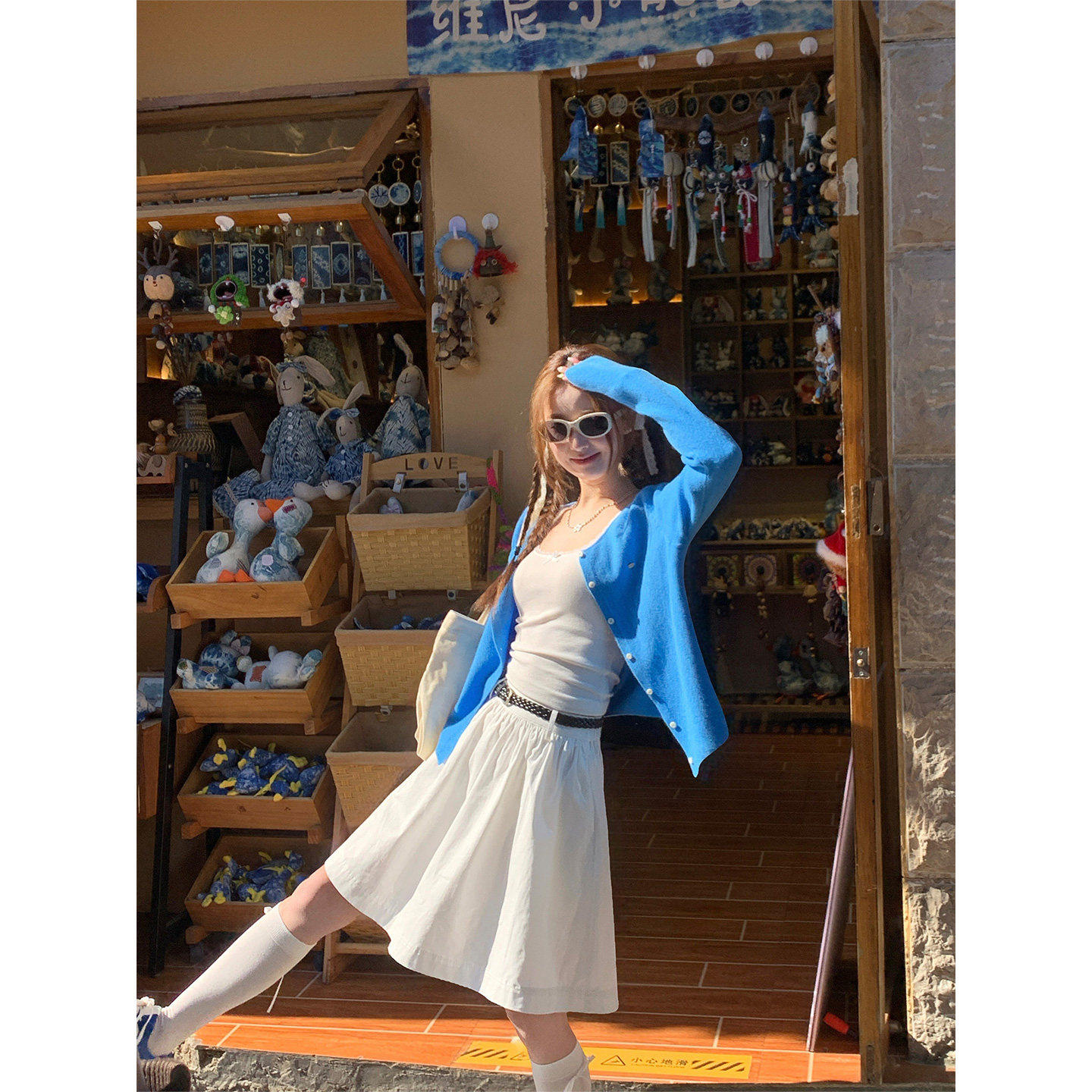 苏三三 白色a字半身裙女梨型身材遮胯显瘦早春2026新款小个子中裙