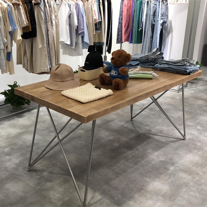 北欧服装店桌子中间摆放中岛台实木落地展示桌简约长方形流水台