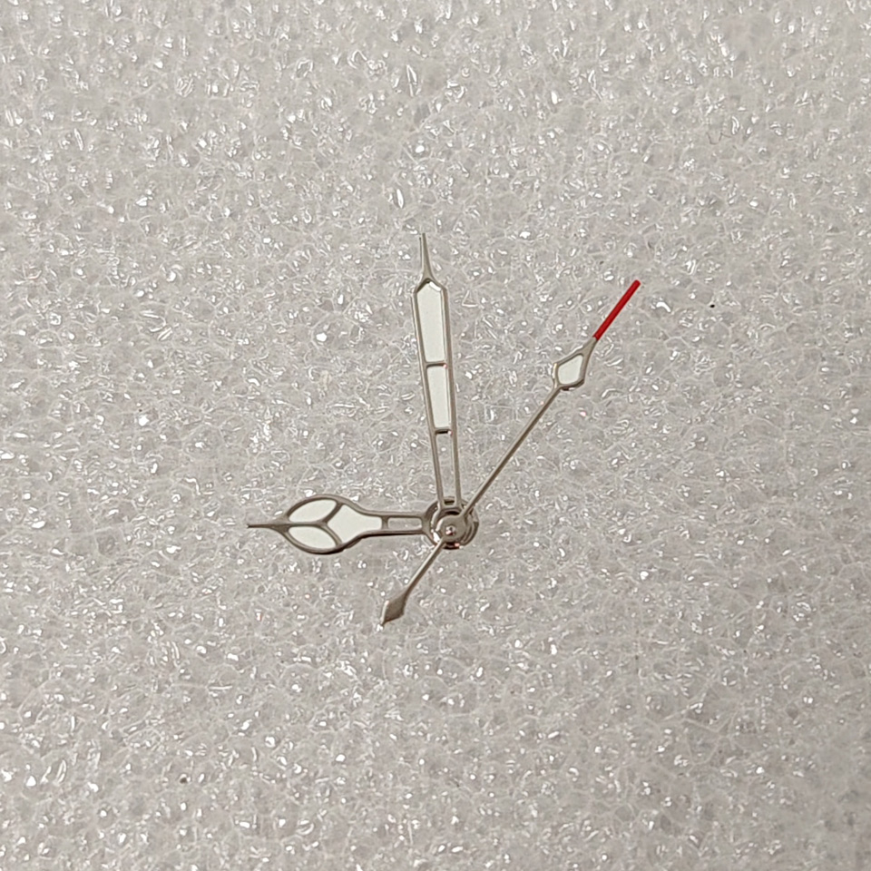 thumbnail for The NH35A modified hands with silver edges and gold edges are filled with white oil green luminous hands for the NH35 36 4R movement