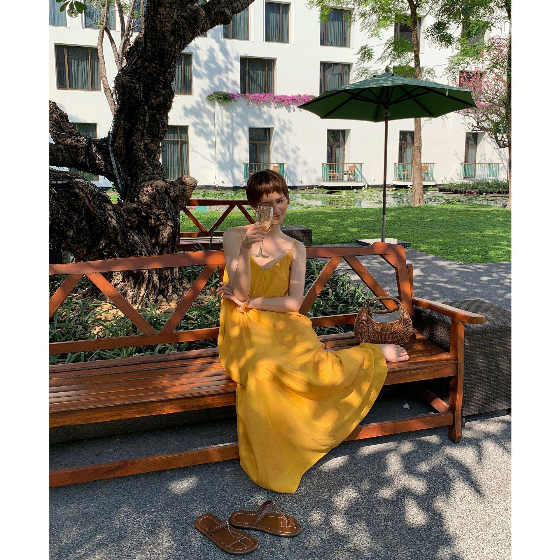 UNITY MODE海边度假露背吊带连衣裙女夏季宽松a字裙温柔长裙子
