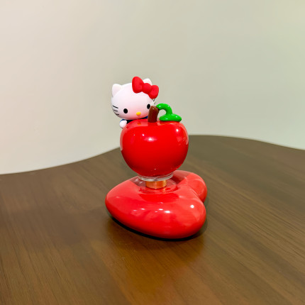 正版HelloKitty红苹果车载转转乐摆件旋转凯蒂猫创意桌面装饰品