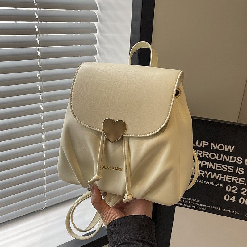 休闲百搭洋气小众女式双肩包2024新款出游旅行后背包超火迷你书包