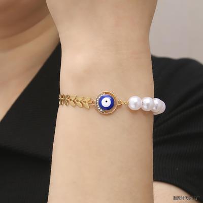 叶子仿珍珠镶钻蓝眼睛手