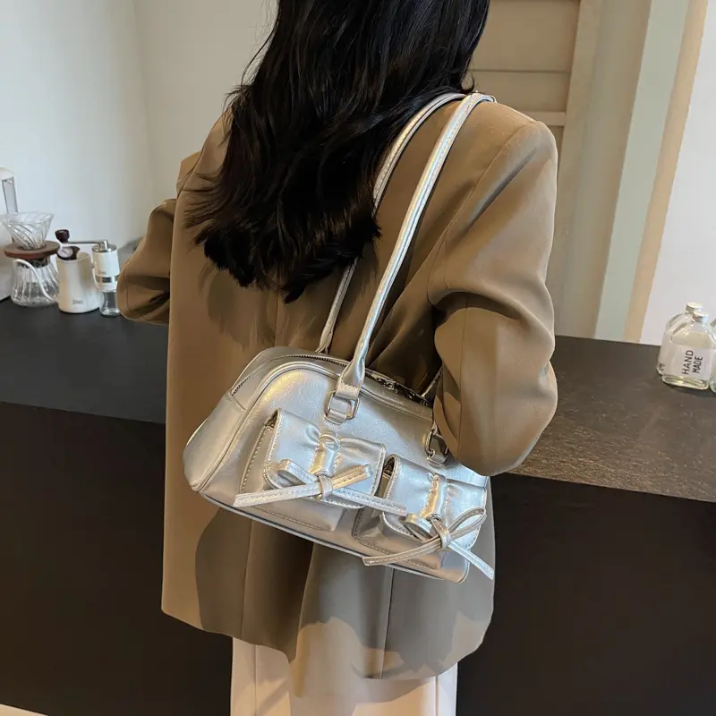 甜酷JK少女蝴蝶结单肩腋下包包女2025新款韩国手提保龄球包