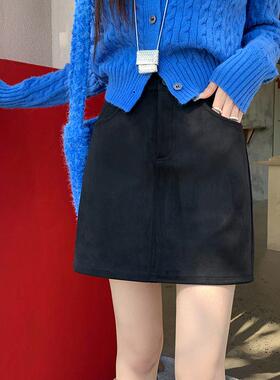 麂皮绒黑色半身裙女2025春新款百搭显瘦口袋a字裙高腰包臀短裙子