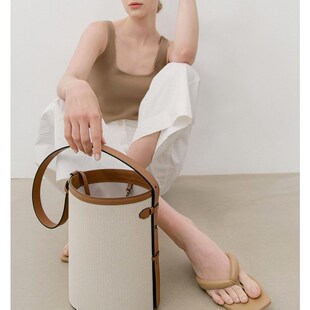 韩国小众真皮水桶包包女2024新款帆布牛皮单肩包圆筒包斜挎高级感