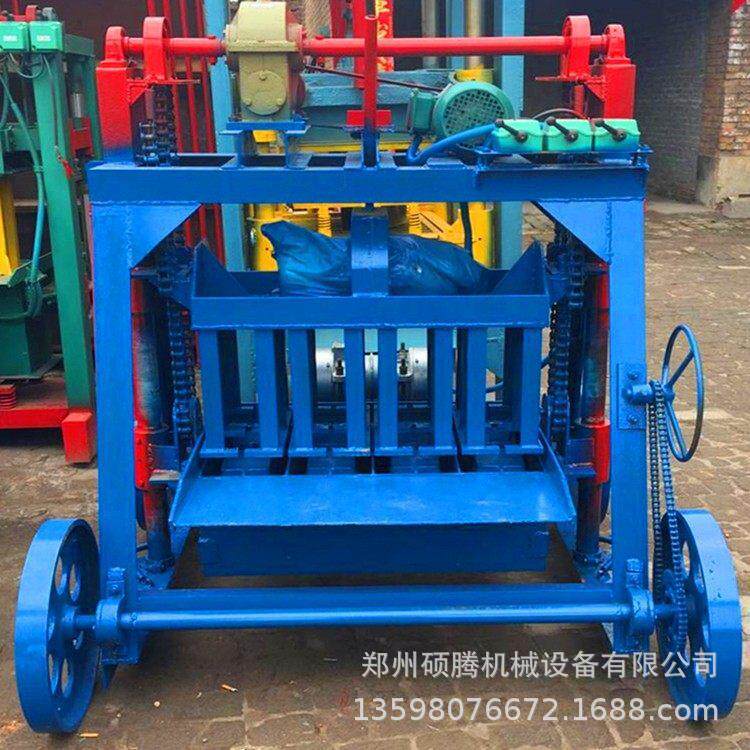 大轮子移动式一次四块空心制砖机供应小型免烧水泥制砖机
