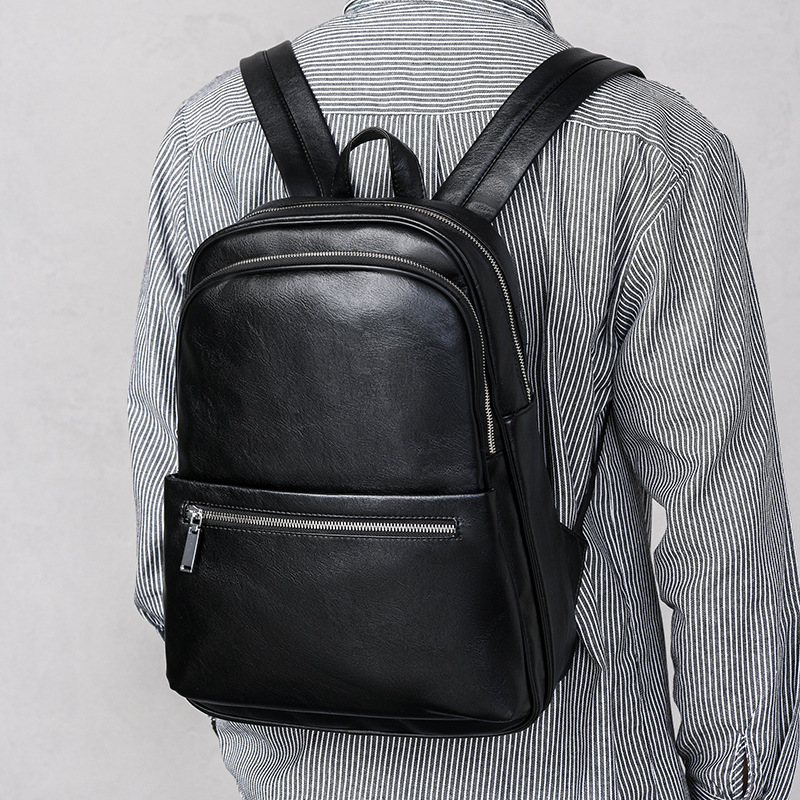 欧洲站时尚新款防泼水学生背包大容量旅行背包男士商务双肩包