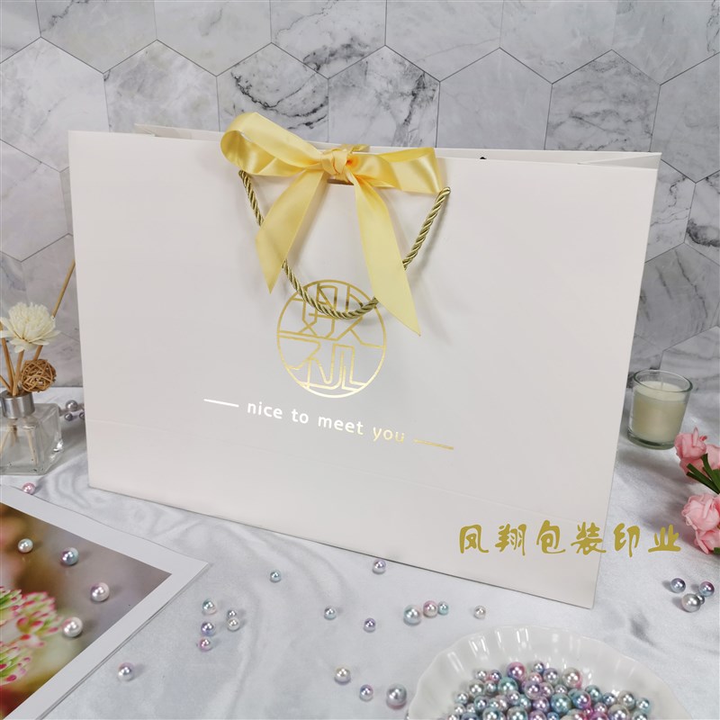 厂家纸袋定做男女服l装袋子定制高档手提购物袋牛皮纸袋订做印log