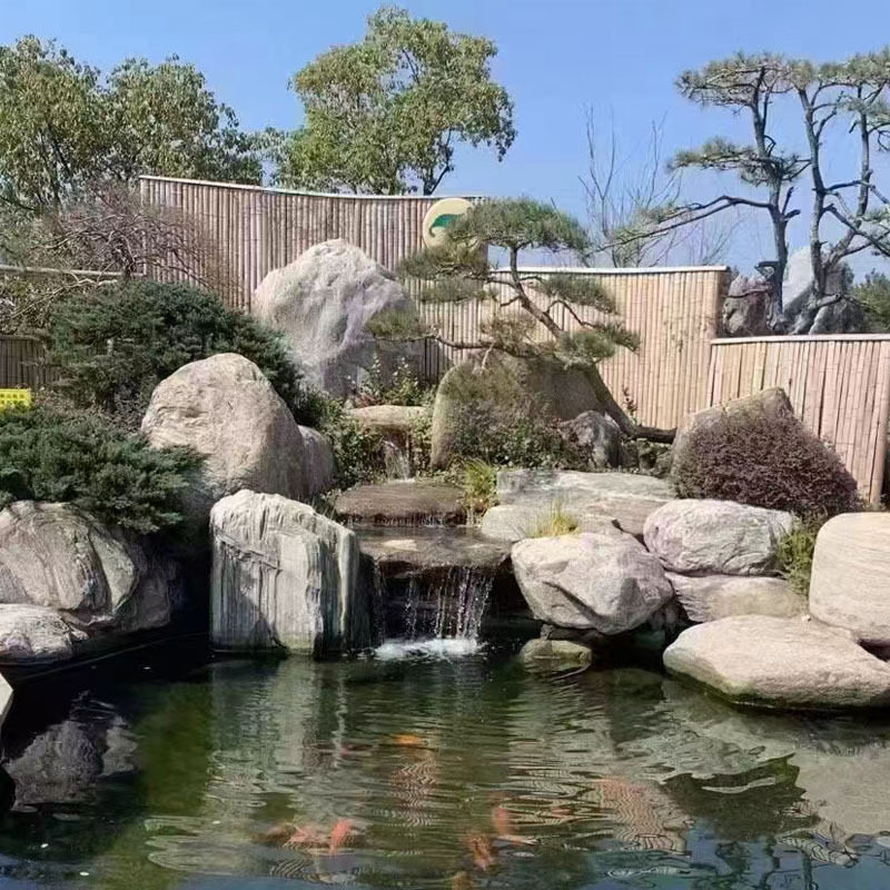 泰山石庭院鱼池假山制作 矿山石料批发 园林景观河道护坡点缀造景
