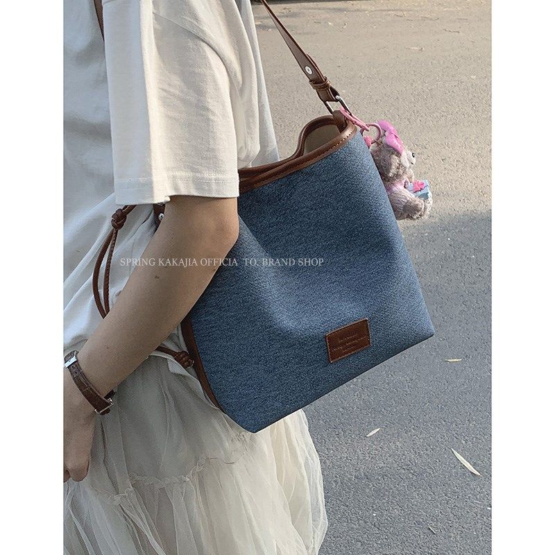 韩国小众水桶包包女2024新款时C尚大容量牛仔通勤包休闲百搭单肩,箱包皮具/热销女包/男包,水桶包,淘宝优惠券,粉丝福利购,淘宝优惠卷