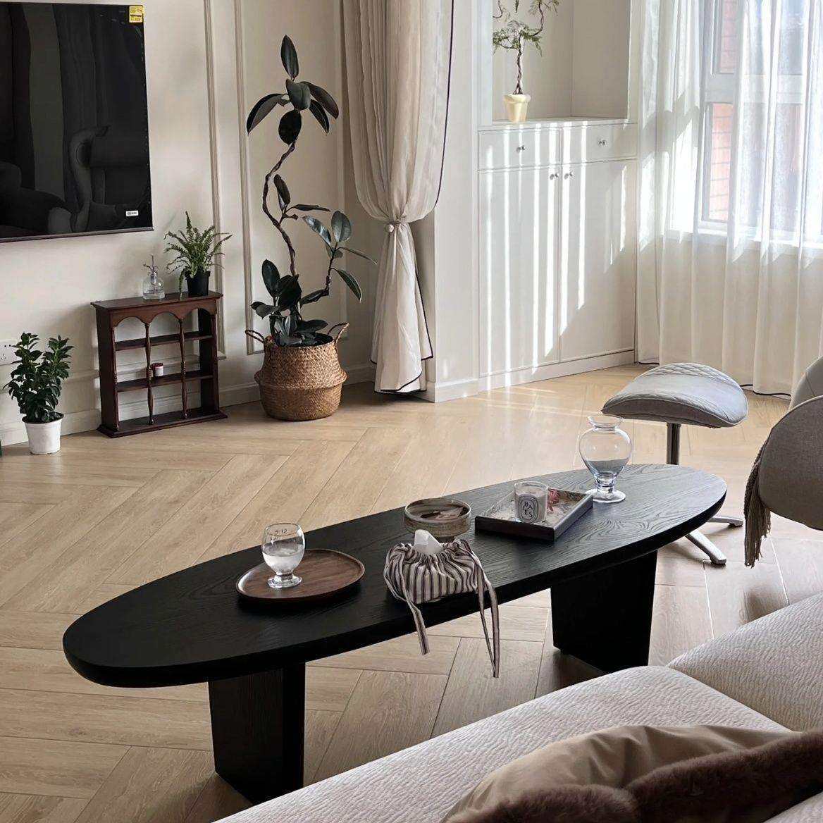 黑色实木茶几椭圆形北欧简约客厅家用小户型设计师民宿原木桌子