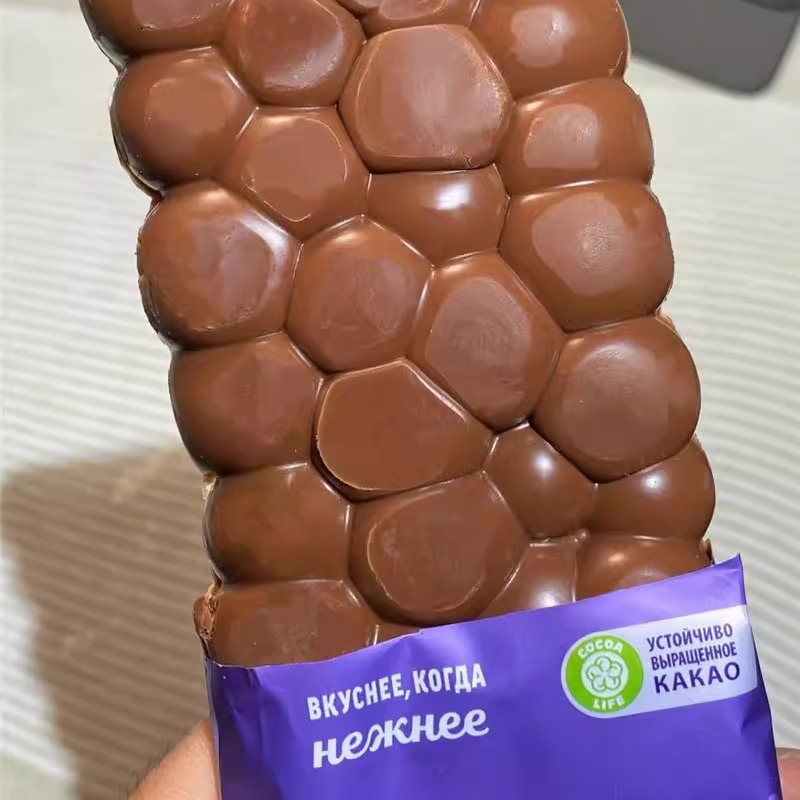 俄罗斯进口德国MILKA/妙卡巧克力牛奶气泡榛仁奥利奥