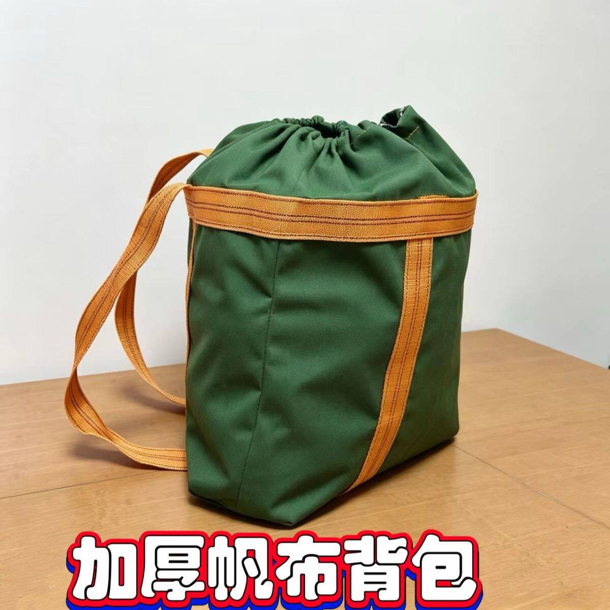 新款绿色帆布背包户外行李包登山包搬家袋可提可背两用加厚帆布