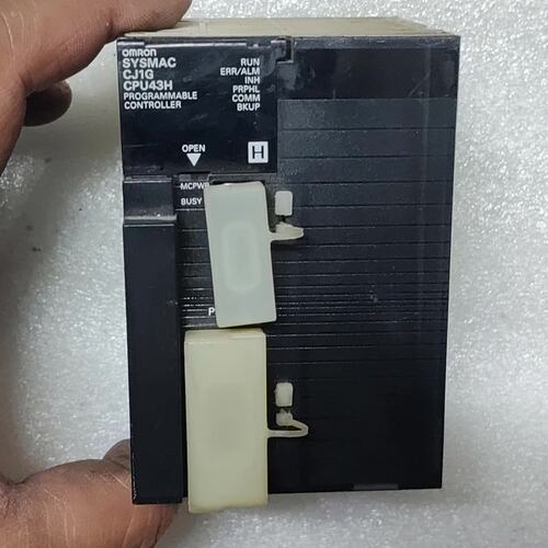 议价CJ1G-CPU43H.实物拍摄，成色如图，卡扣断了，可维修