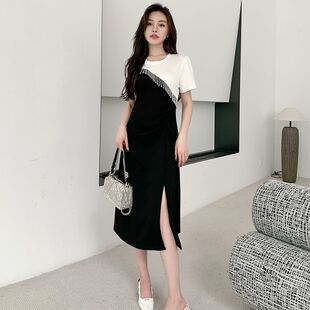 黑白拼接连衣裙女夏2025新款礼服裙假两件链条流苏收腰显瘦开叉裙
