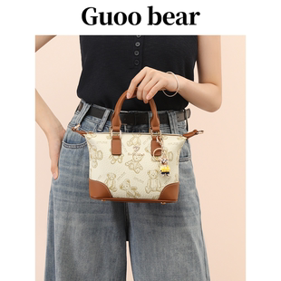 天天维尼熊GUOOBEAR手提斜挎包女生2025新款通勤龙骧小包包饺子包