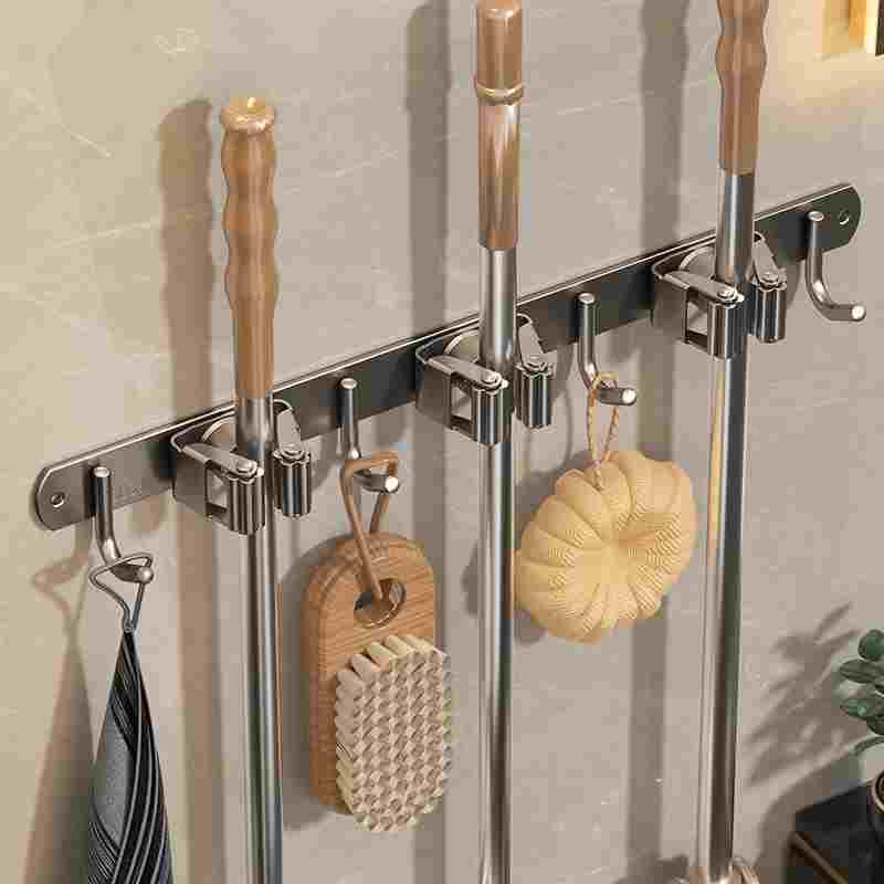 德国进口拖把壁挂夹不锈钢挂钩一排免打孔卫生间收纳扫把固定架