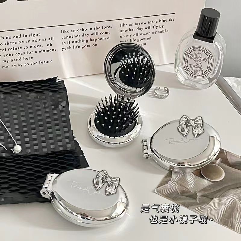 迷你便携一体按摩小镜子气垫梳女士儿童随身折叠顺发按摩小梳子