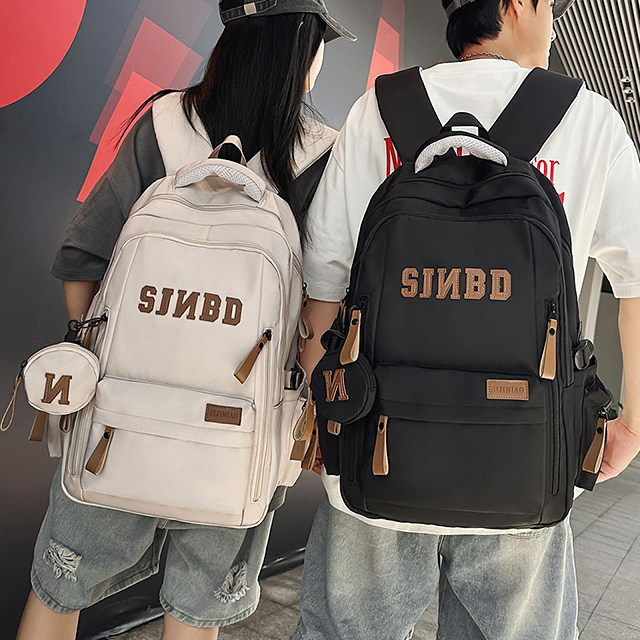 书包男高中生简约风大容量双肩包女学生初中生减负护脊背包新款