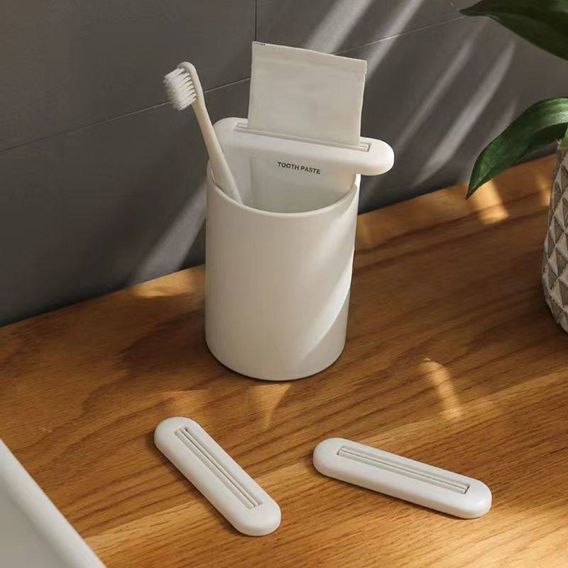家用手动创意牙膏懒人挤牙膏夹子压器神器小样洗面奶护手霜挤压