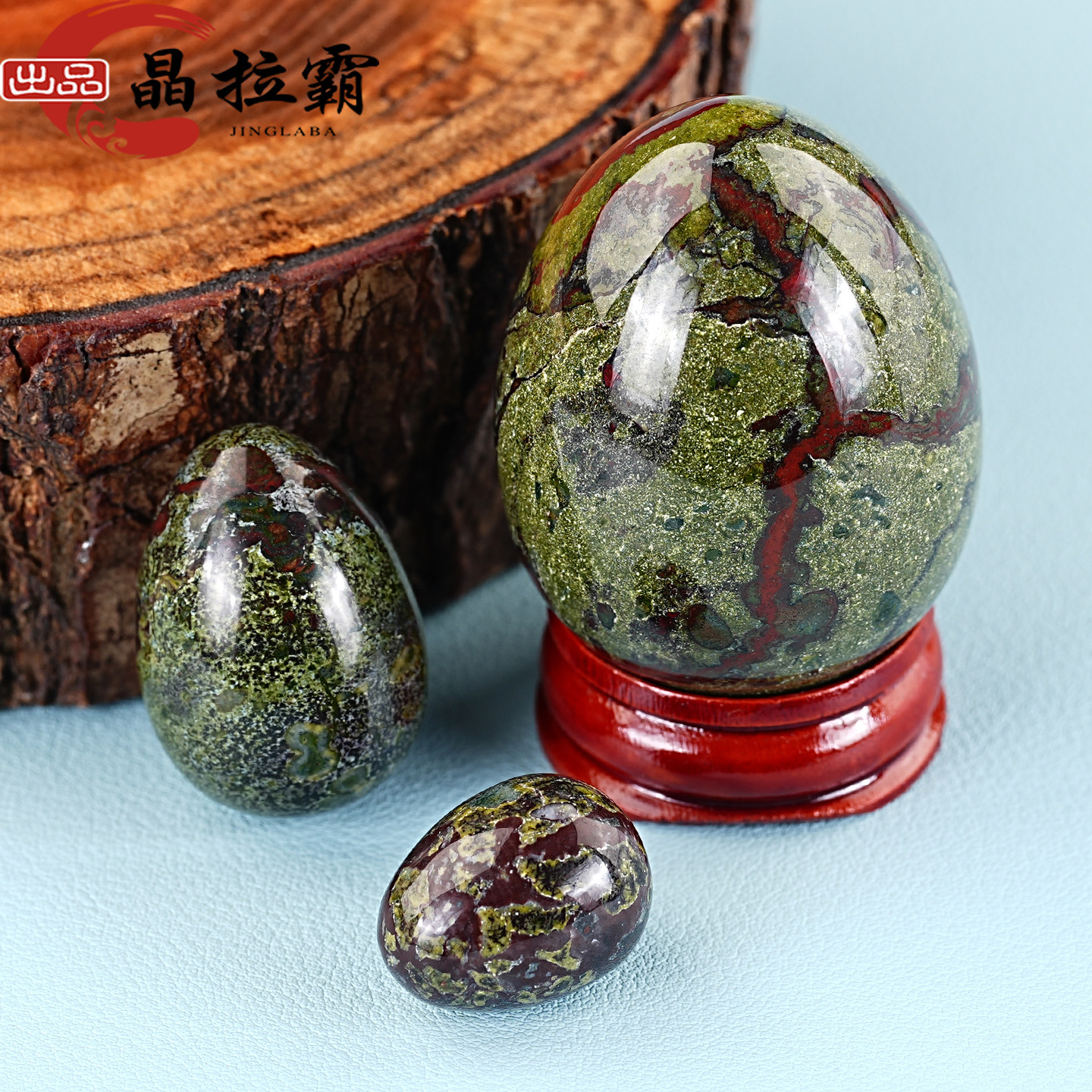 天然龙血石滚石摆件鸡蛋造型图片