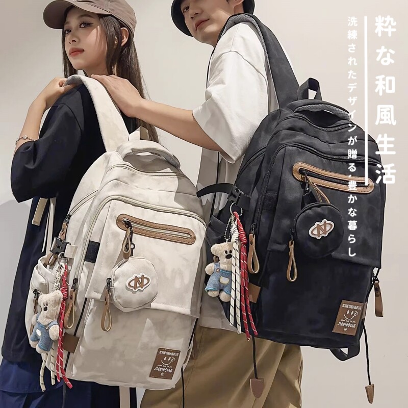 日本严选书包女小学生男生背包大学生高中初中生拼接旅行双肩包