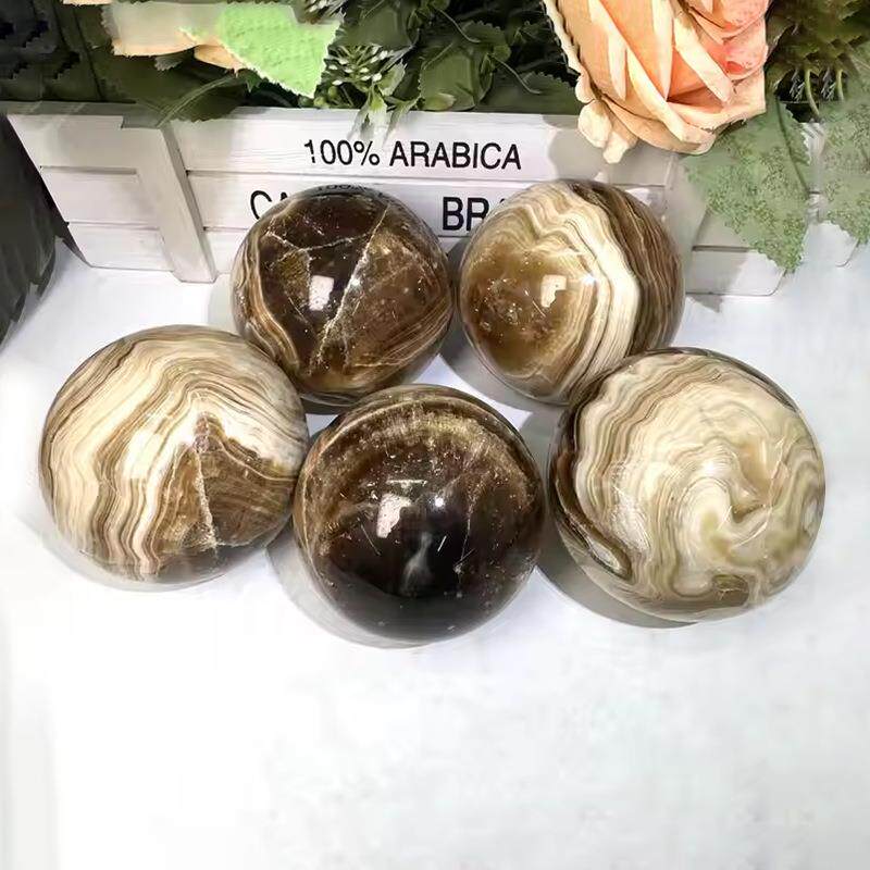 厂供天然琥珀球水晶球摆件黄色球家居办公风水摆件工艺品原石打磨