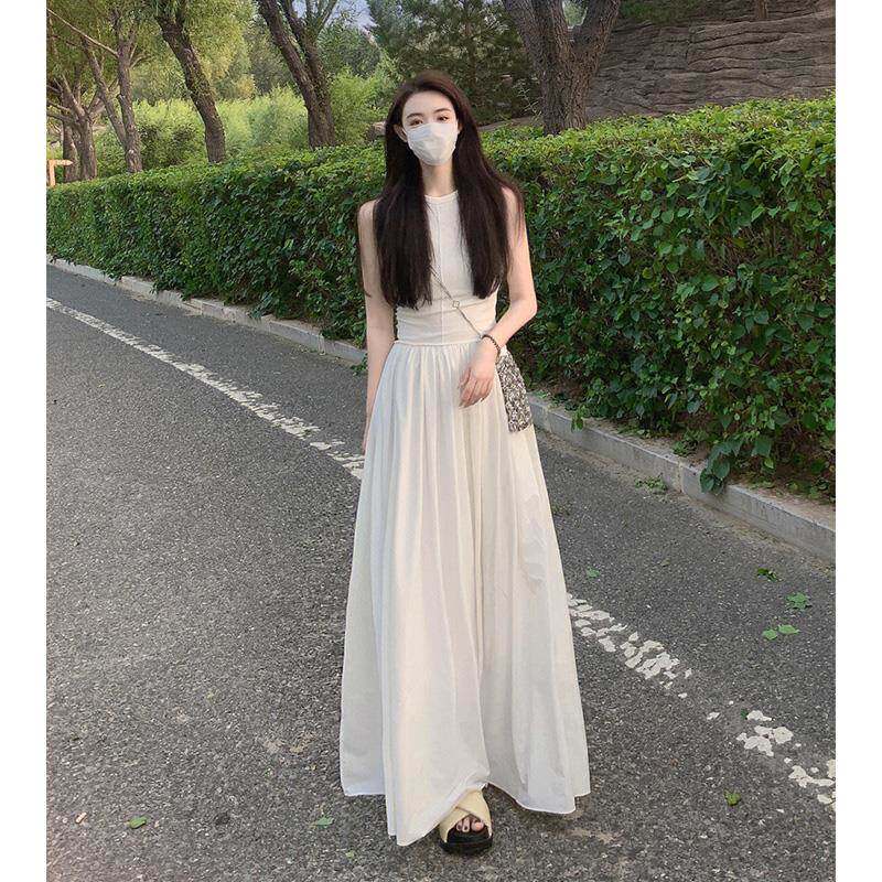 欧洲站2025夏装新款白色仙气文艺风连衣裙吊带收腰惊艳高级感长裙