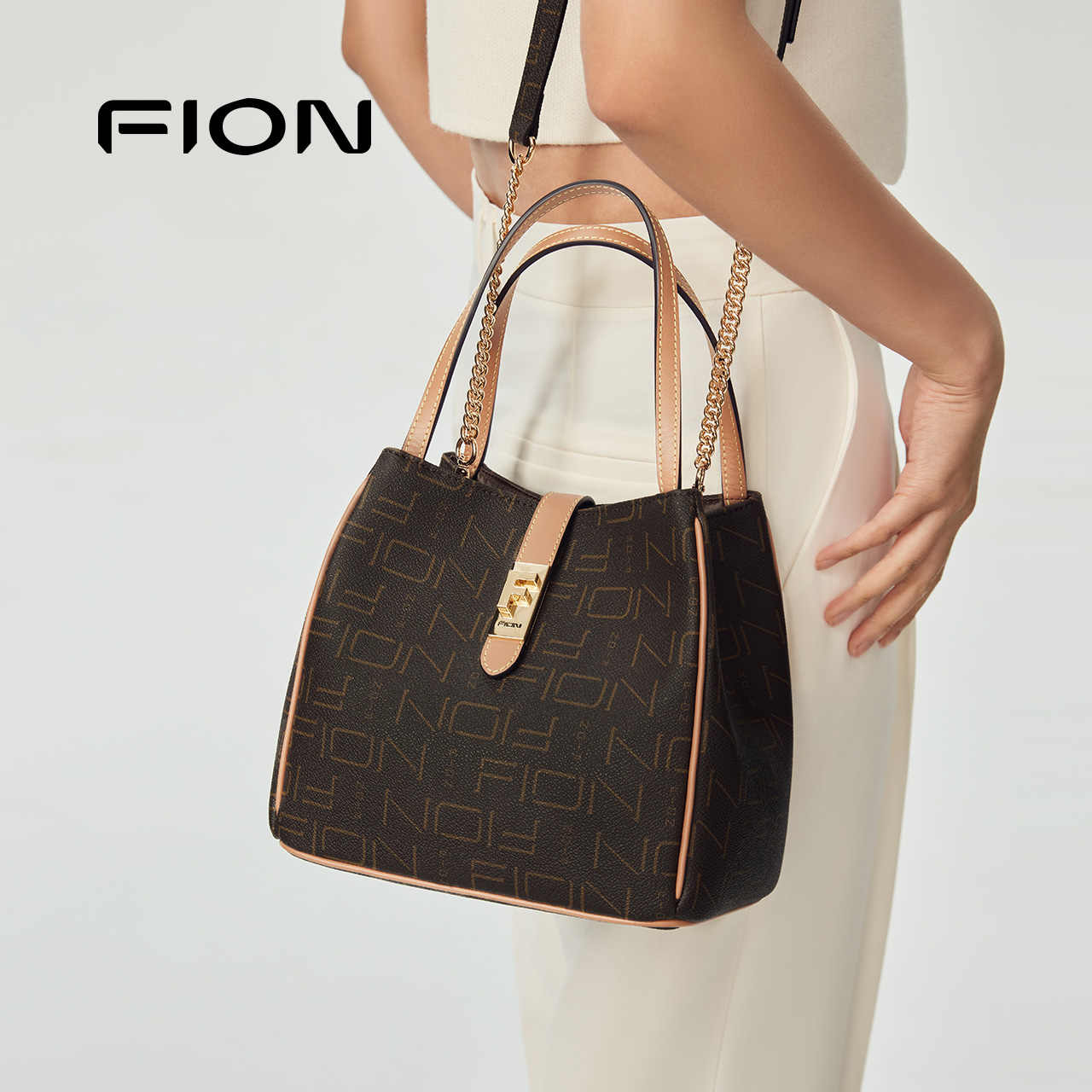 Fion/菲安妮复古老花手提水桶包