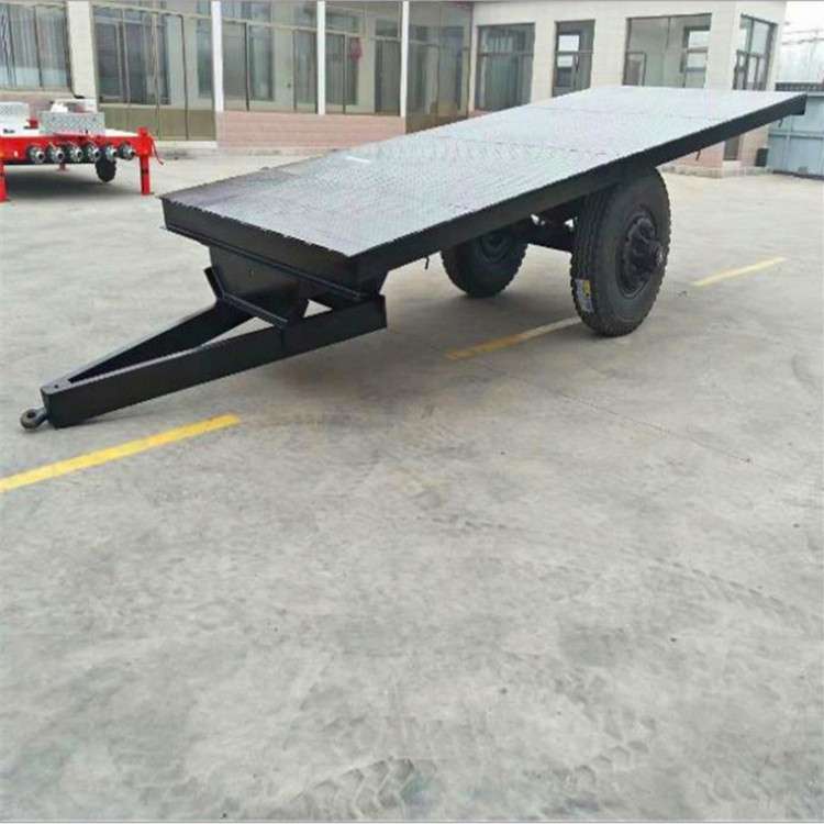 上新货物中转拖板车 牵引式无轨平板拖车 工矿平板拖车价格