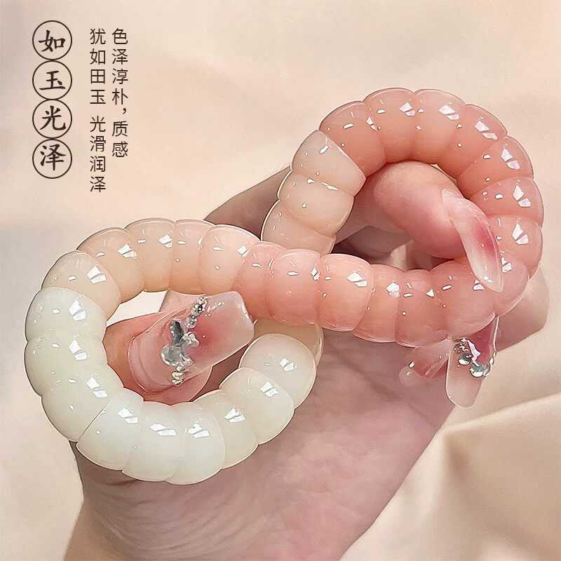 奶油系猪大肠菩提根手串渐层绕指