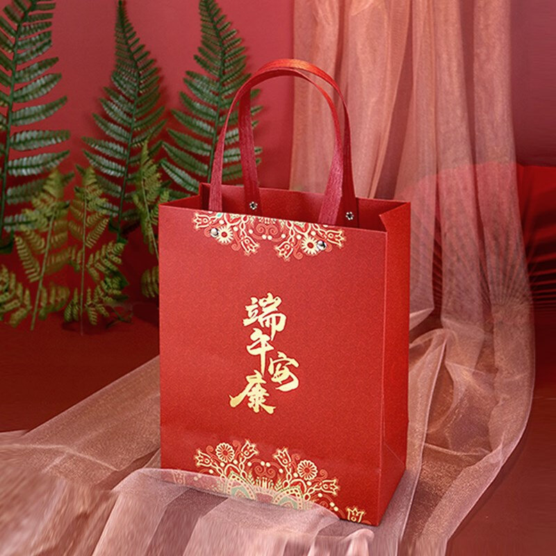 加厚手提铆钉定制lqogo暗花纸袋购物礼品包装喜庆传统大小送礼号