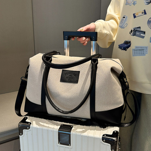 新款大容量女旅行包手提行李包男