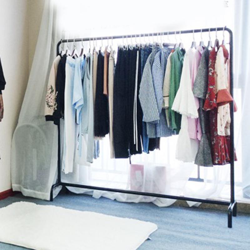 晒衣服的架子一条杠卖衣服店里的挂衣架铁艺衣帽架一字落地超承重